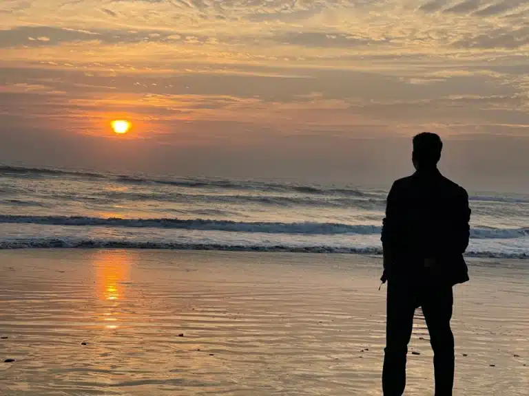 Man steering out over the ocean
